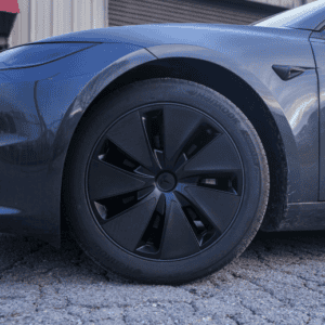 A photo of a Tesla Model 3 Highland Refresh Photon 18in Wheel Cover Wrap
